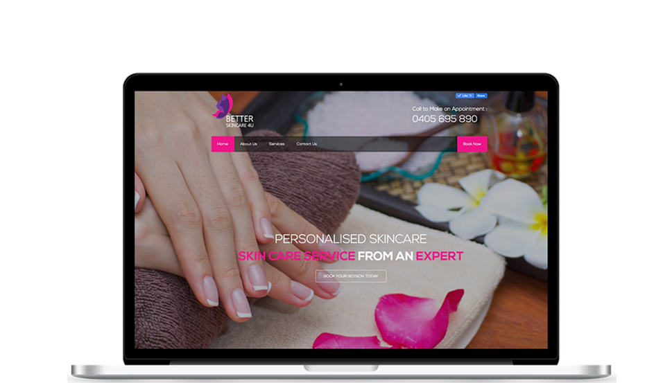 A laptop screen shows a picture of a woman getting her nails done