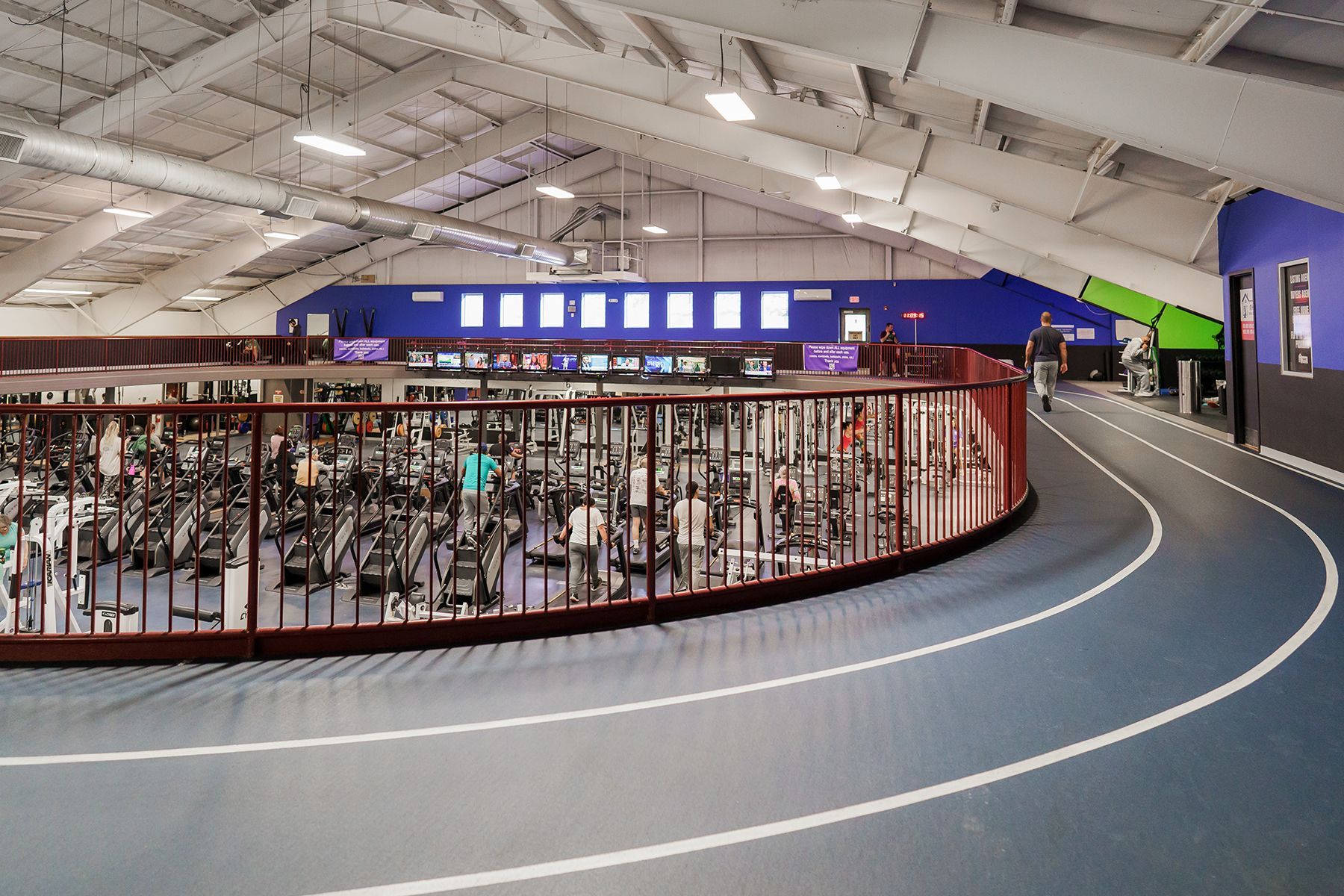 There is a track in the middle of the gym.