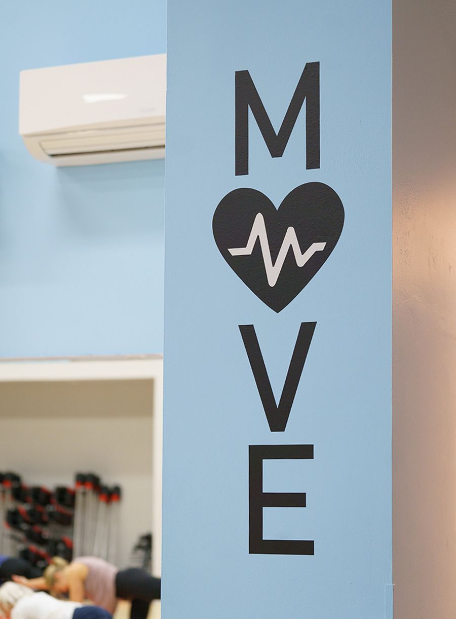 A blue wall with the word move on it