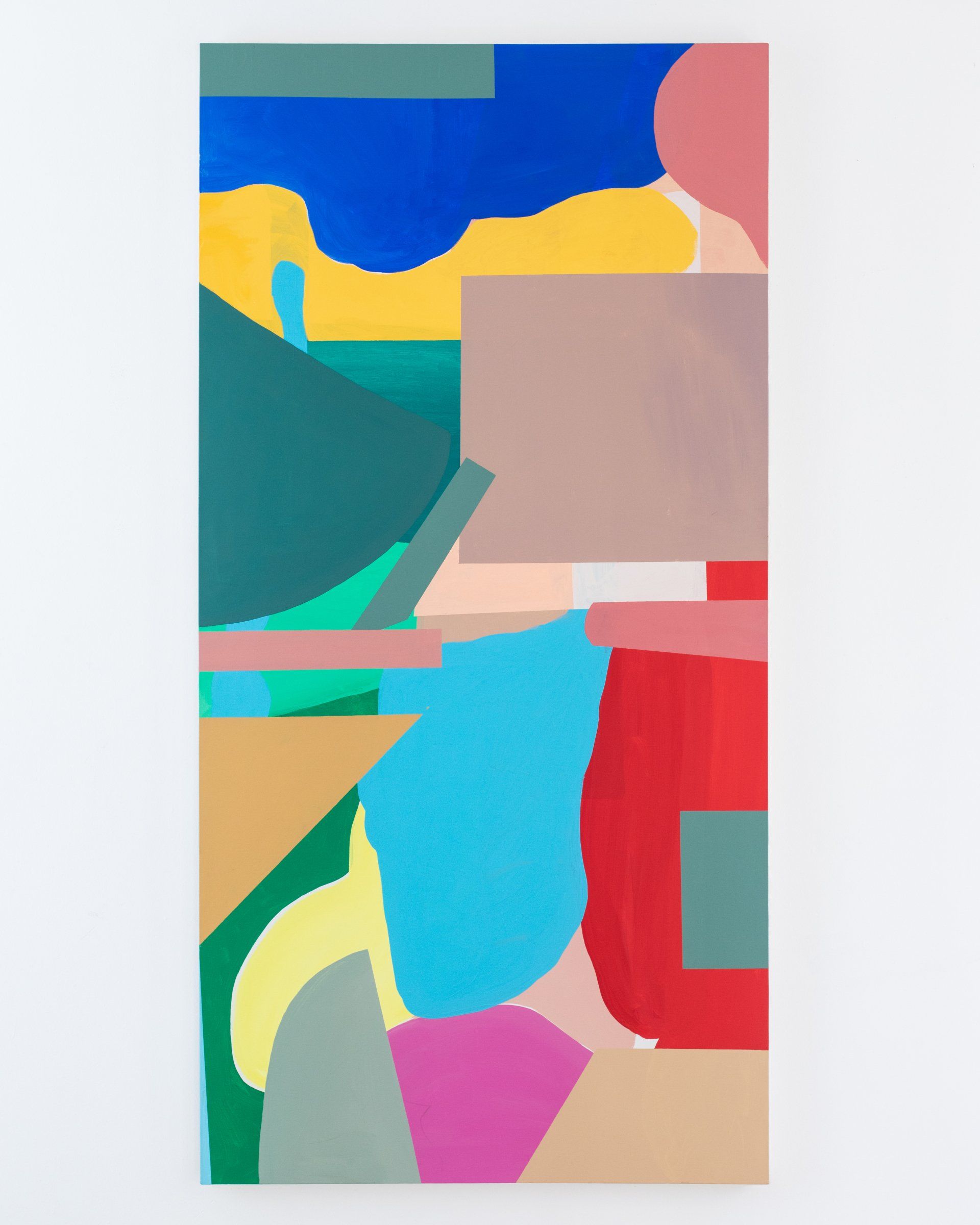 A colorful abstract painting is hanging on a white wall