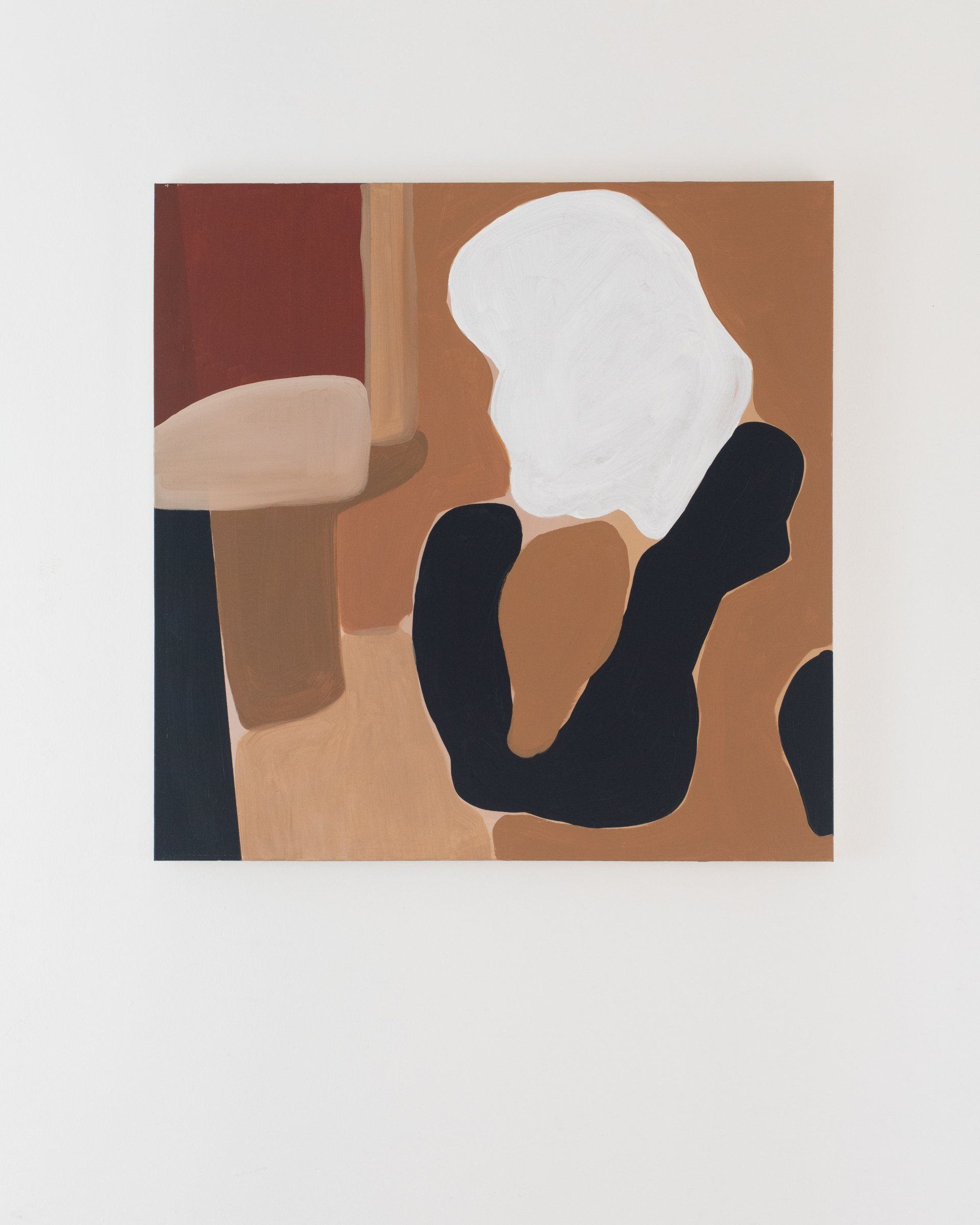 A brown and white painting with a black swirl in the middle