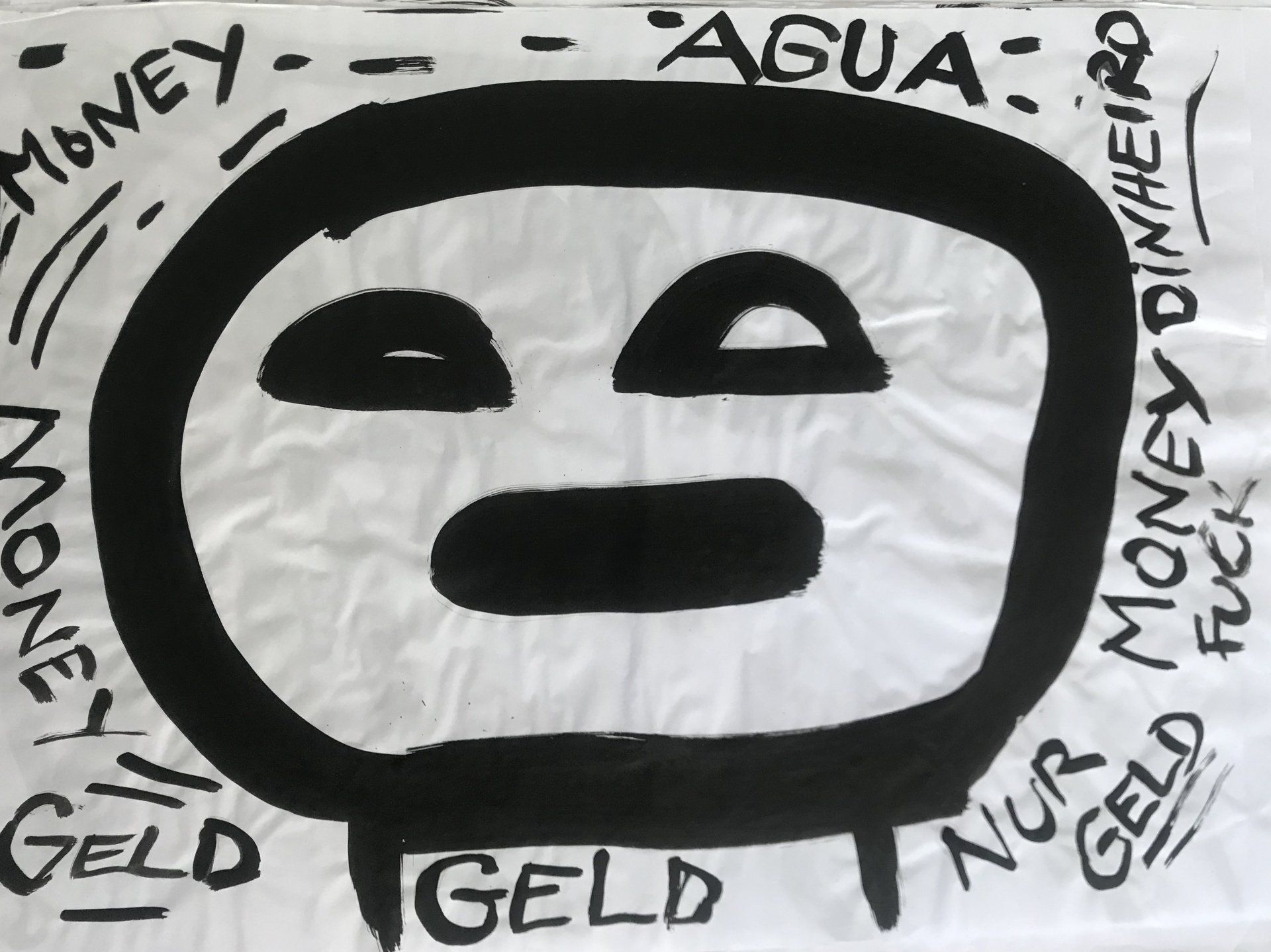 A black and white drawing of a face with money written around it