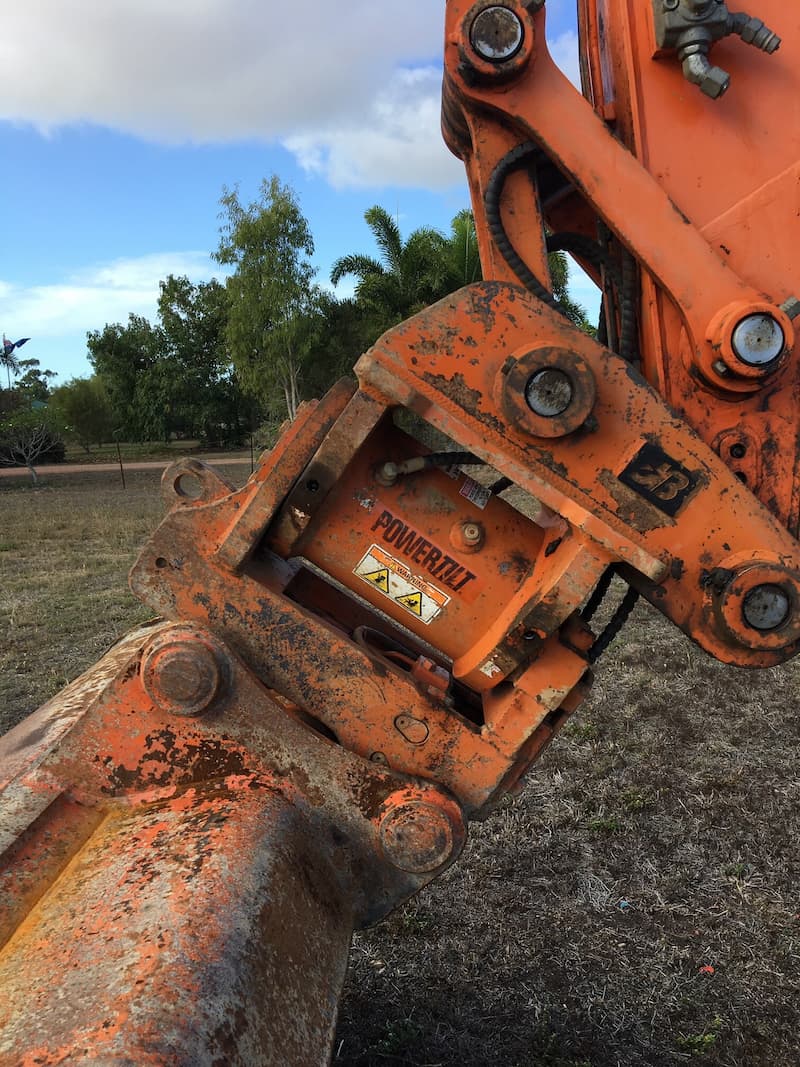 Power Tilt Sticker on Equipment — Riley Earthmoving in Deeragun, QLD