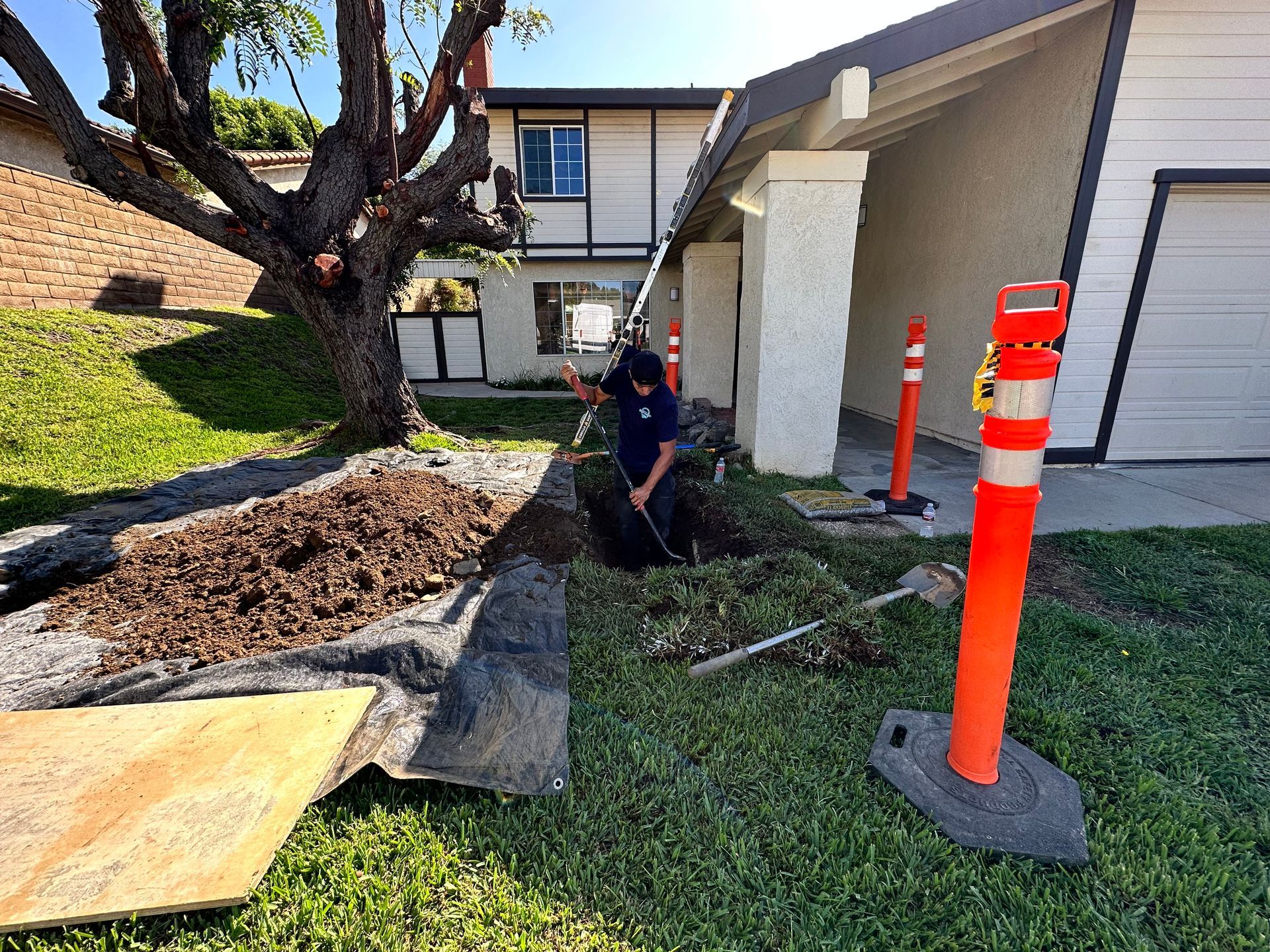 Technician Excavating Sewer