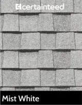 A black and white photo of a roof in mist white.