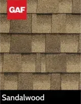 A picture of a roof with shingles in the color sandalwood.