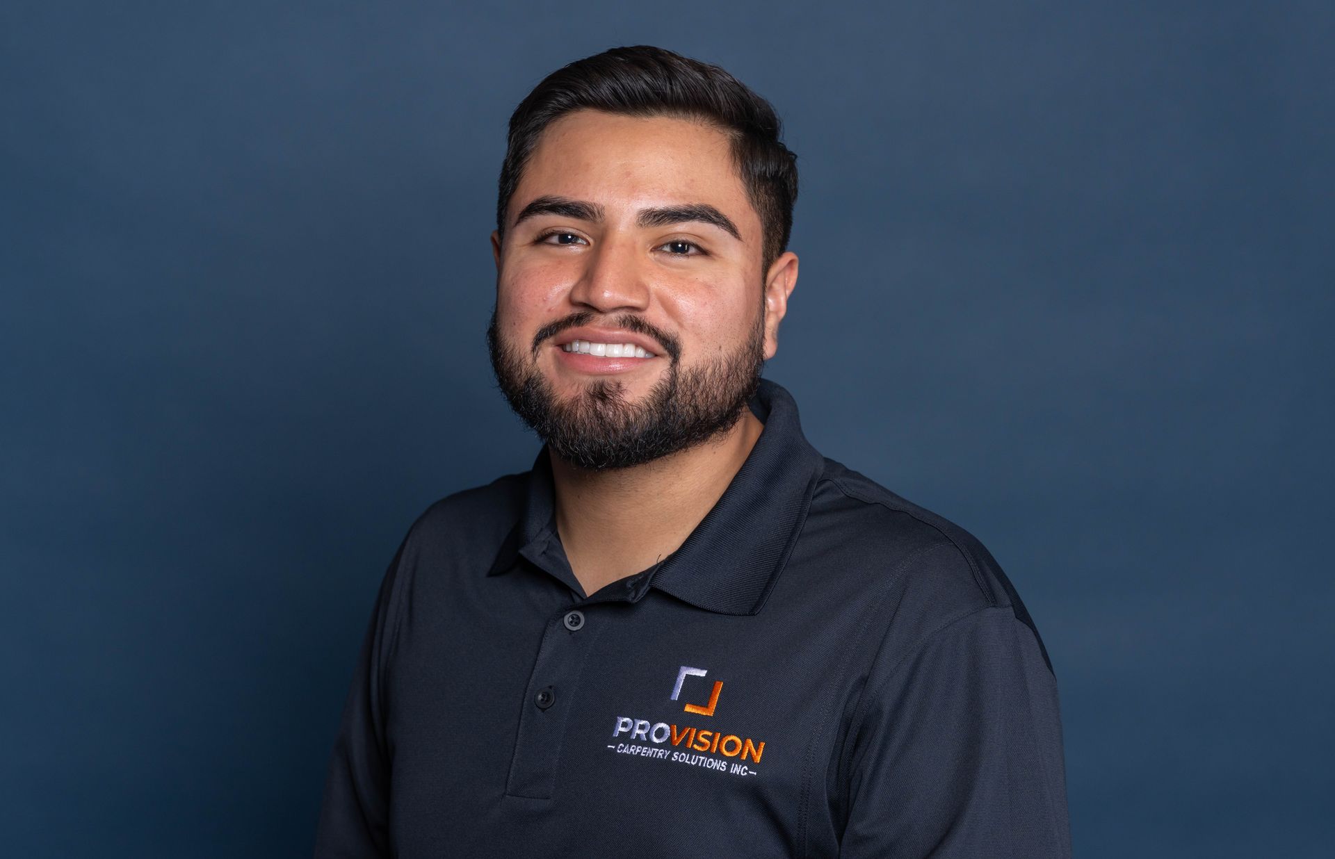 The front door of a house with a wooden porch.