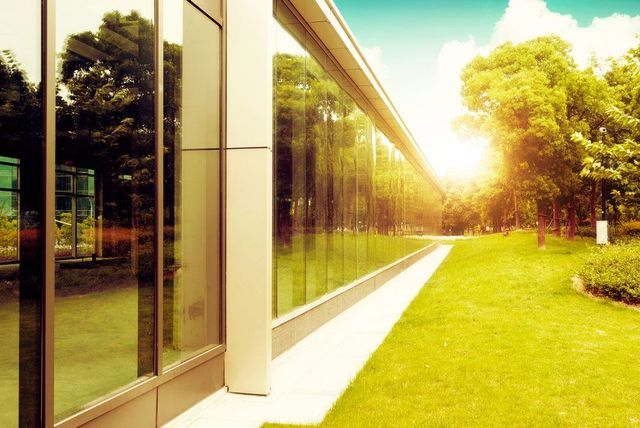 The Sun Is Shining Through The Windows Of A Building — Tint a Car Sunshine Coast In Buderim, QLD