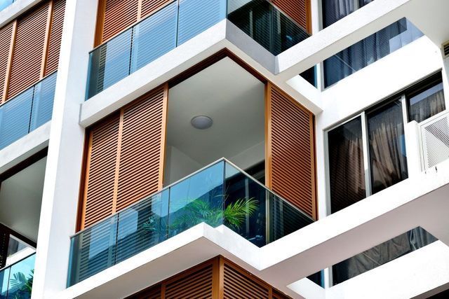 A Building With A Lot Of Windows And Balconies — Tint a Car Sunshine Coast In Buderim, QLD