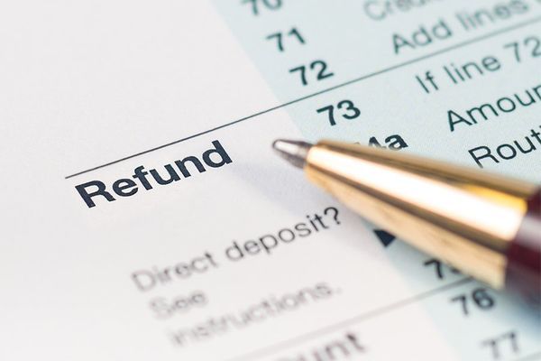 Tax Refund Form And Pen — Baton Rouge, LA — Elite Financial Services, LLC