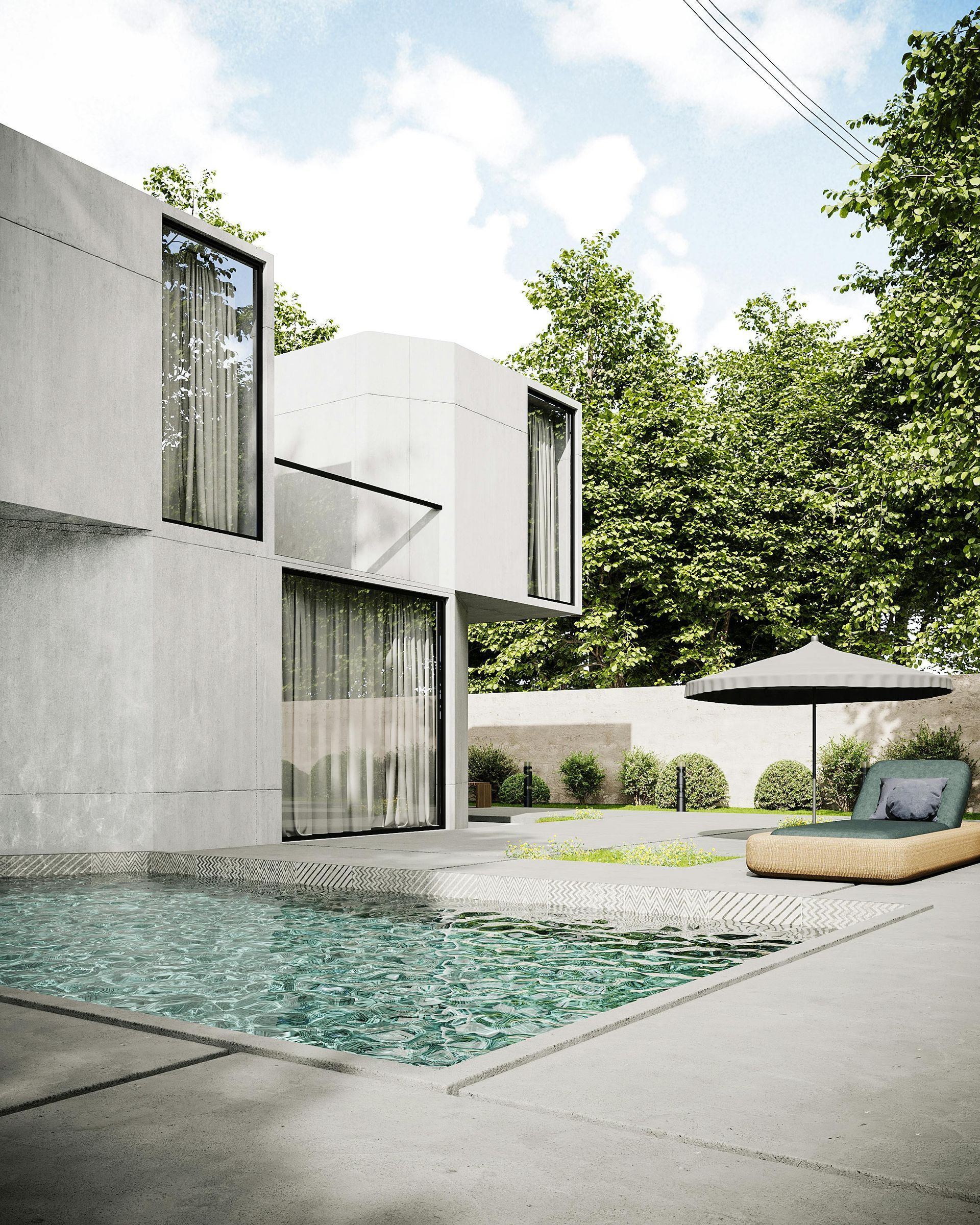 Modern white home with pool, lounge chair, and umbrella in a lush green outdoor setting.