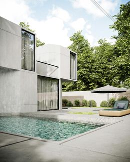 Modern white home with pool, lounge chair, and umbrella in a lush green outdoor setting.