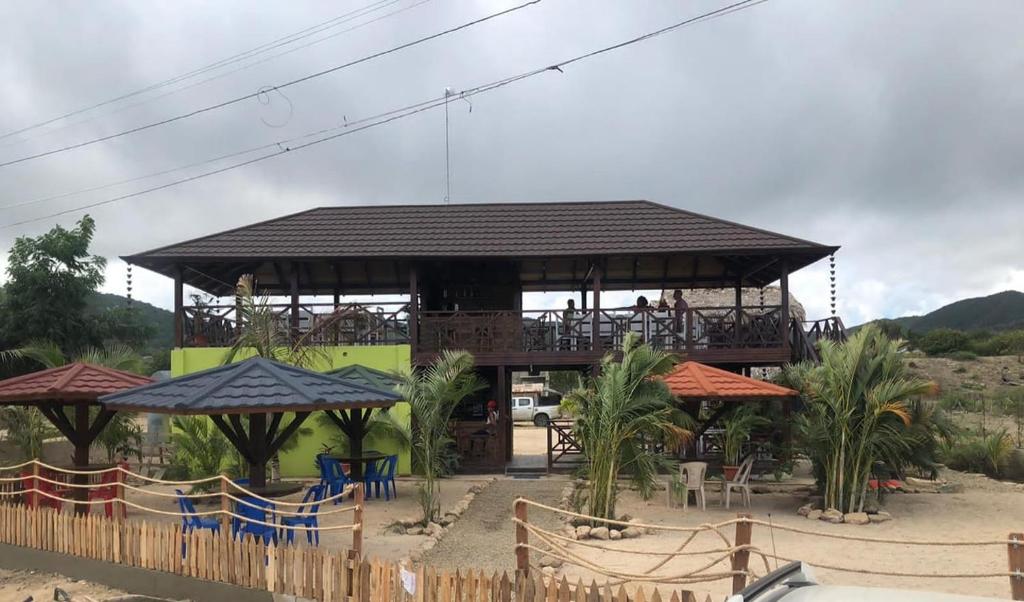 A large house with a roof that is covered in shingles