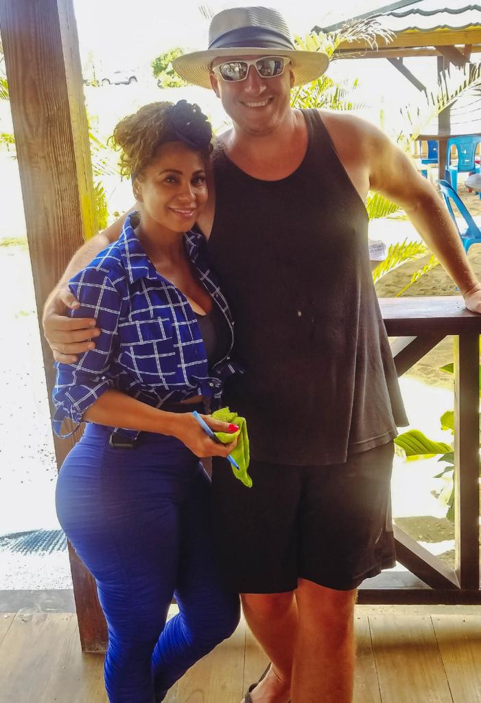 A man and a woman are posing for a picture together