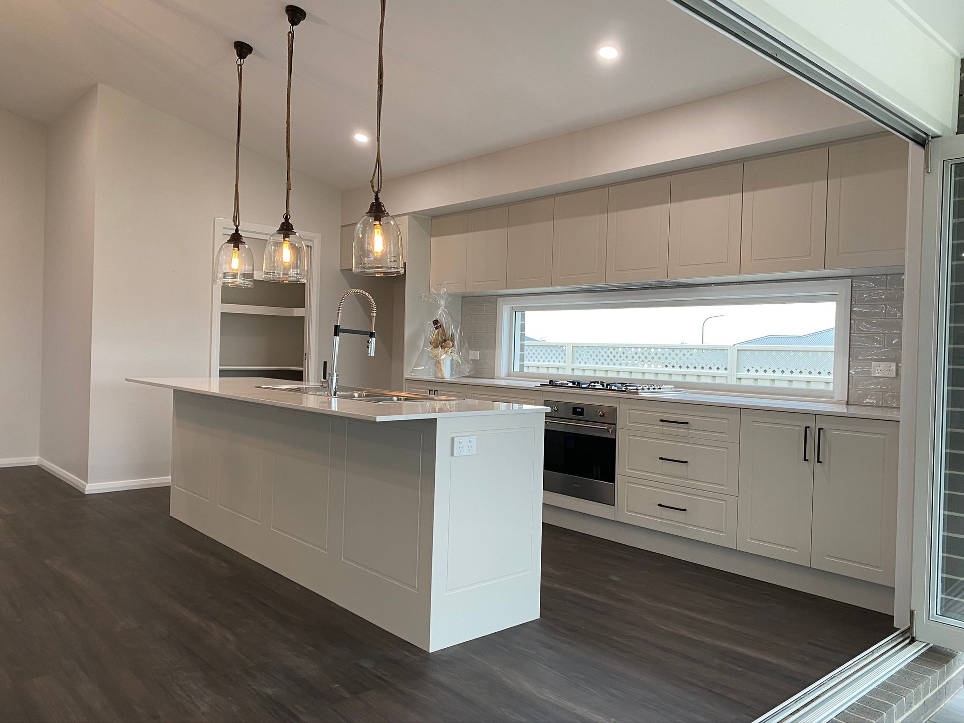 Kitchen Interior With Large Window — Kitchen Renovations in Dubbo, QLD