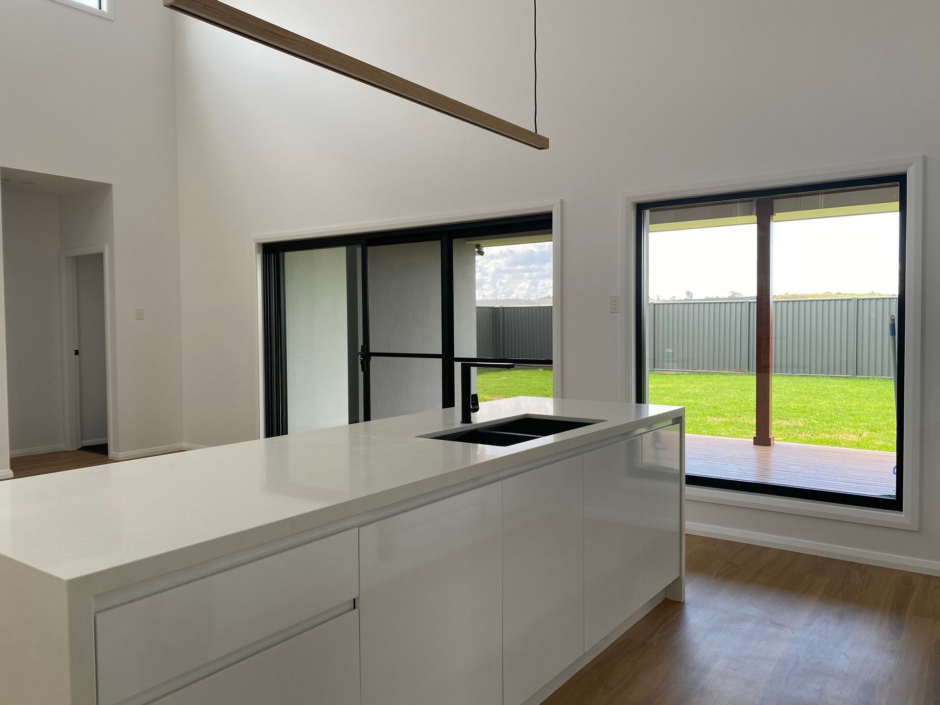 Modern Style Kitchen With White Cabinet — Kitchen Renovations in Dubbo, QLD