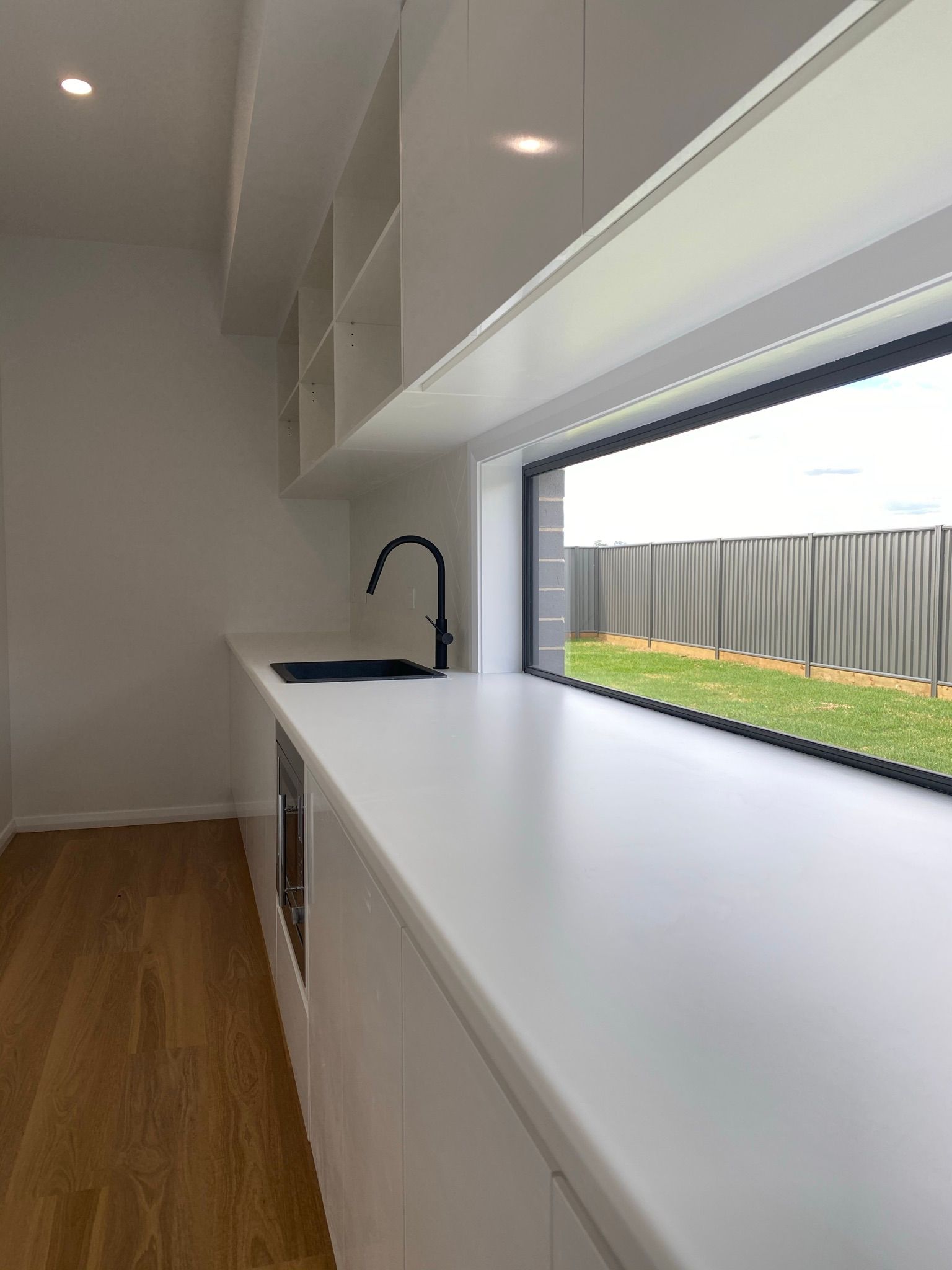 Side View of Countertop With Black Sink — Kitchen Renovations in Dubbo, QLD