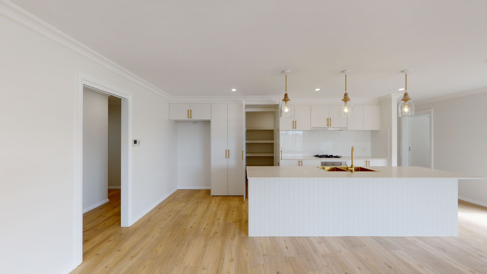 Elegant Kitchen With Pendnat Lights— Kitchen Renovations in Dubbo, QLD