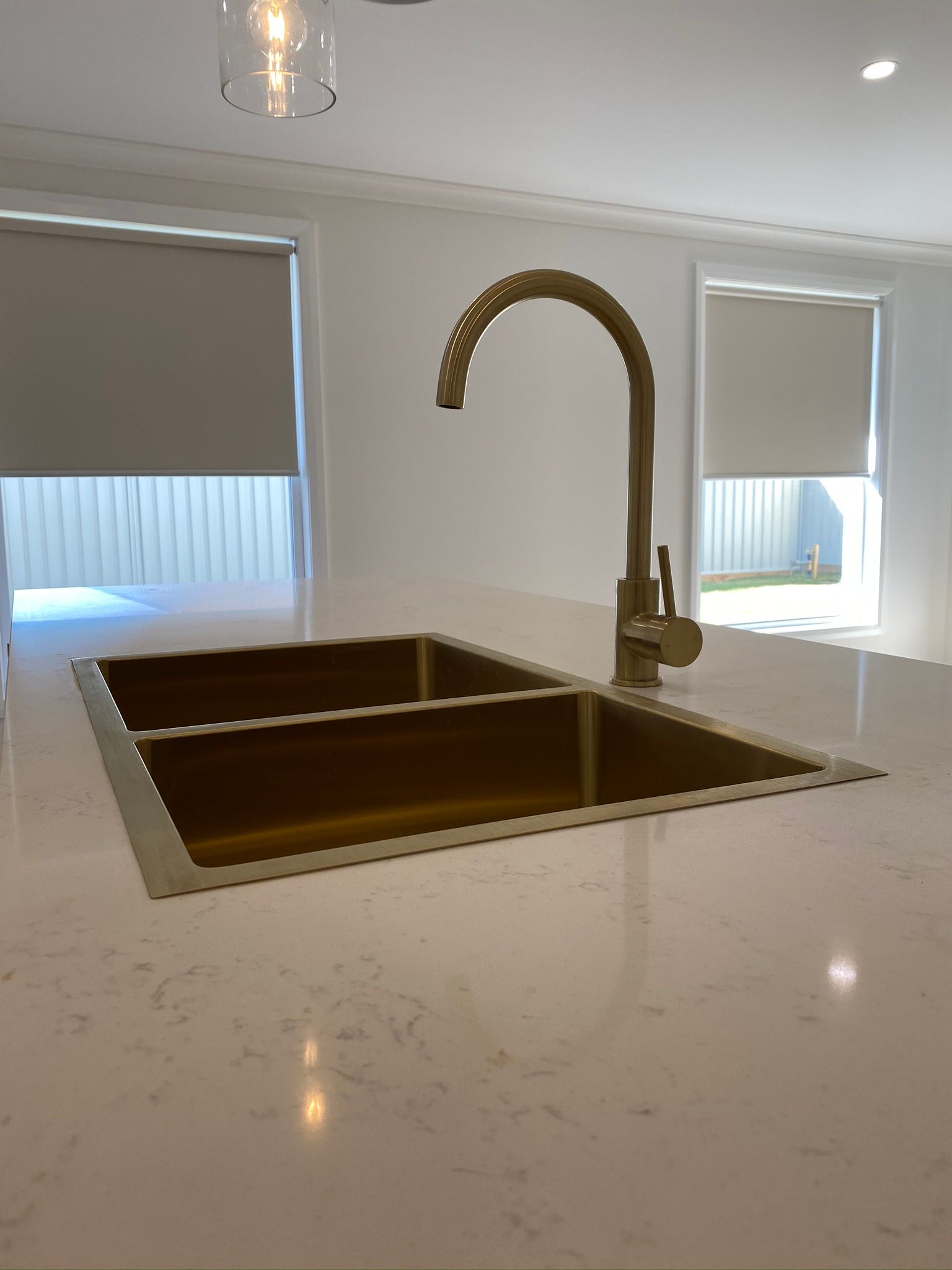 Gold Kitchen Sink and Faucet — Kitchen Renovations in Dubbo, QLD