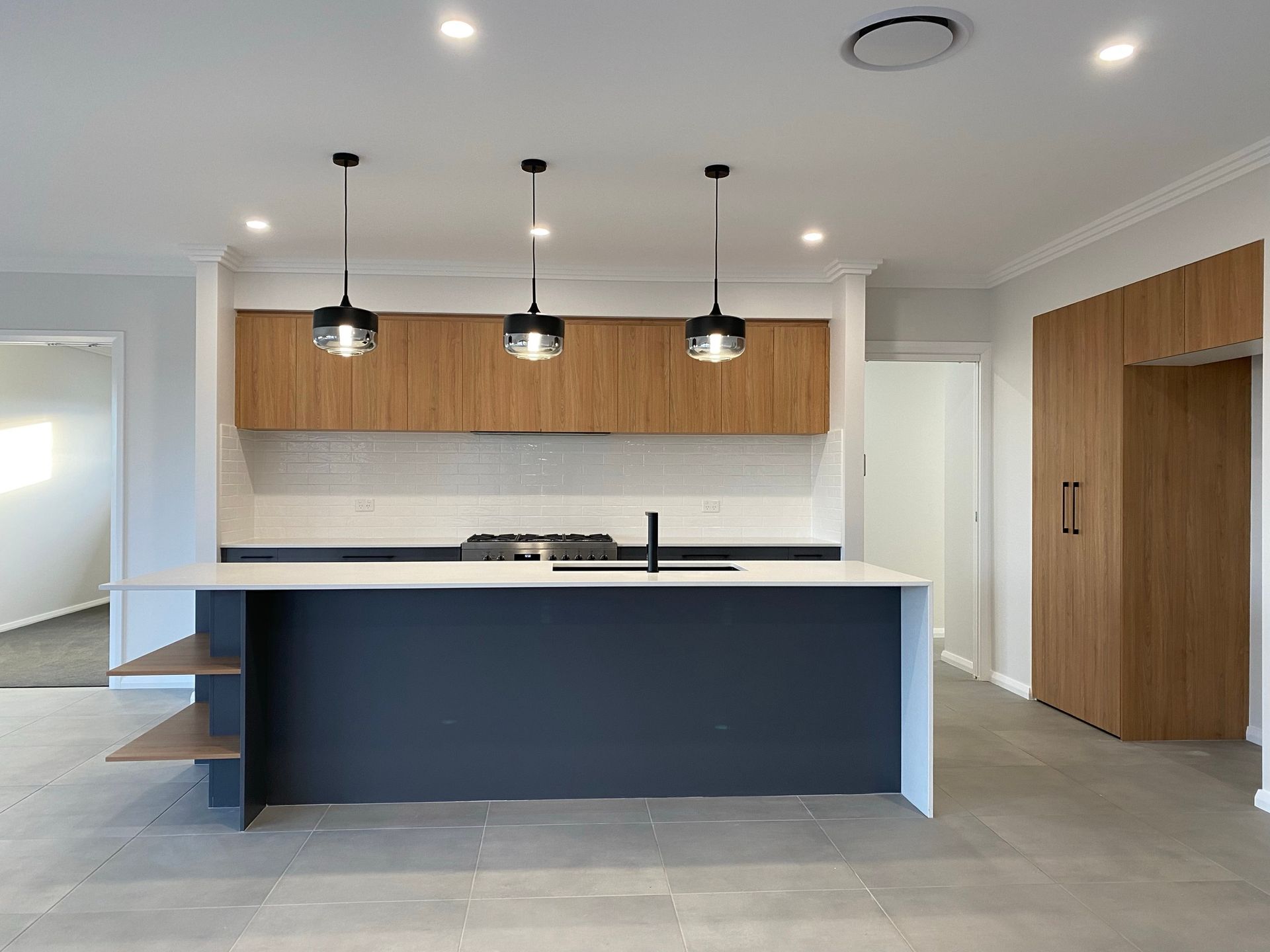 Modern Kitchen With White Countertop — Kitchen Renovations in Dubbo, QLD