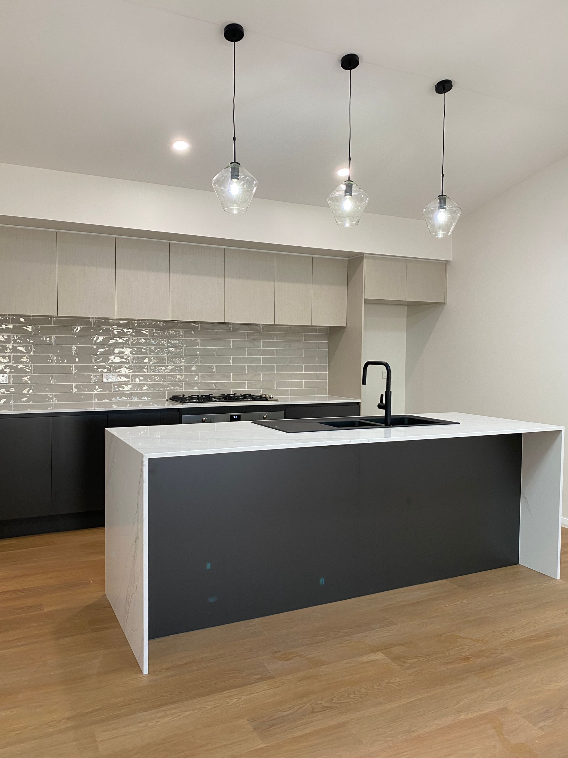 Beautiful Black and White Kitchen — Kitchen Renovations in Dubbo, QLD
