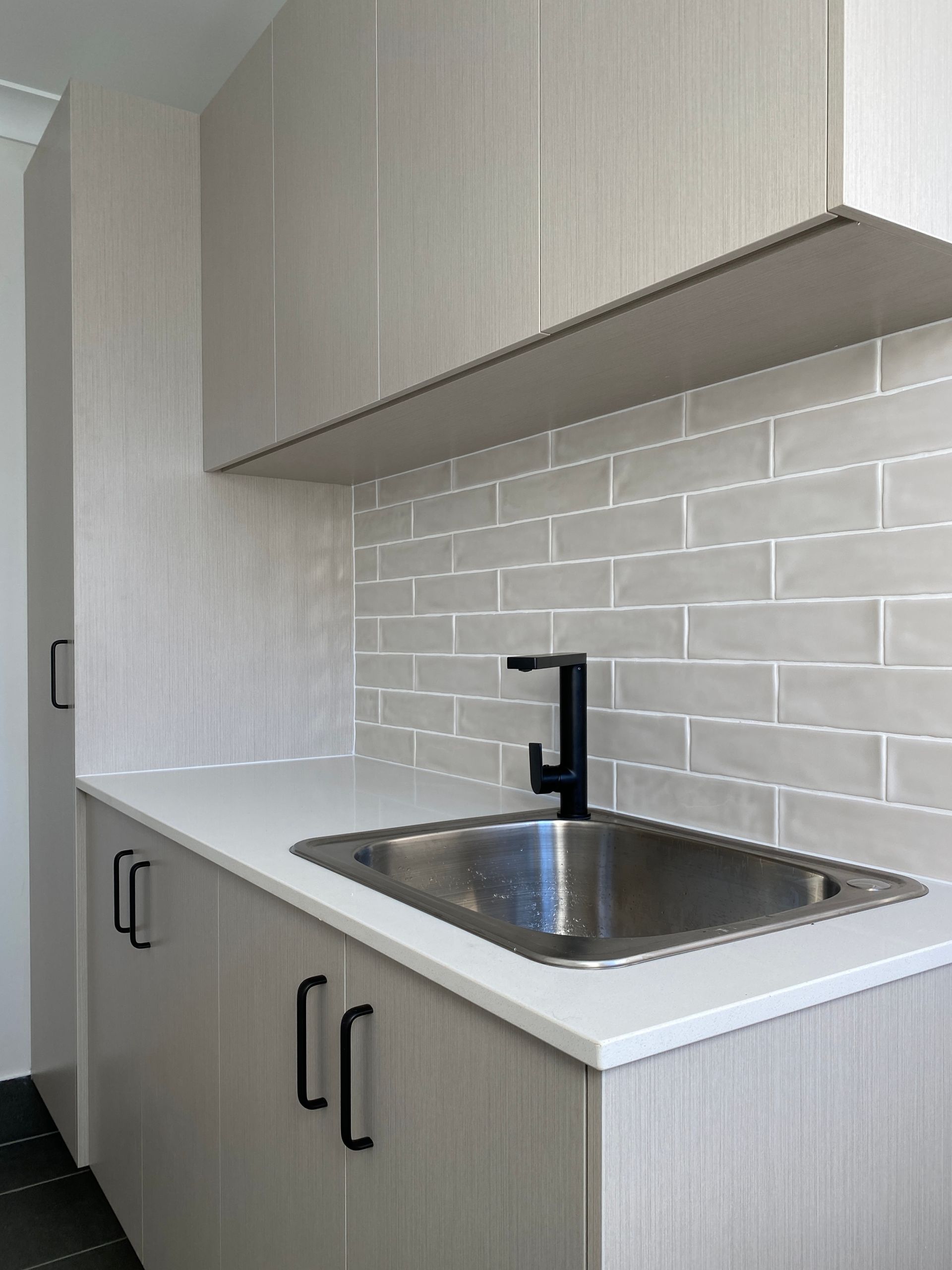 Sink With Grey Subway Tiles — Kitchen Renovations in Dubbo, QLD