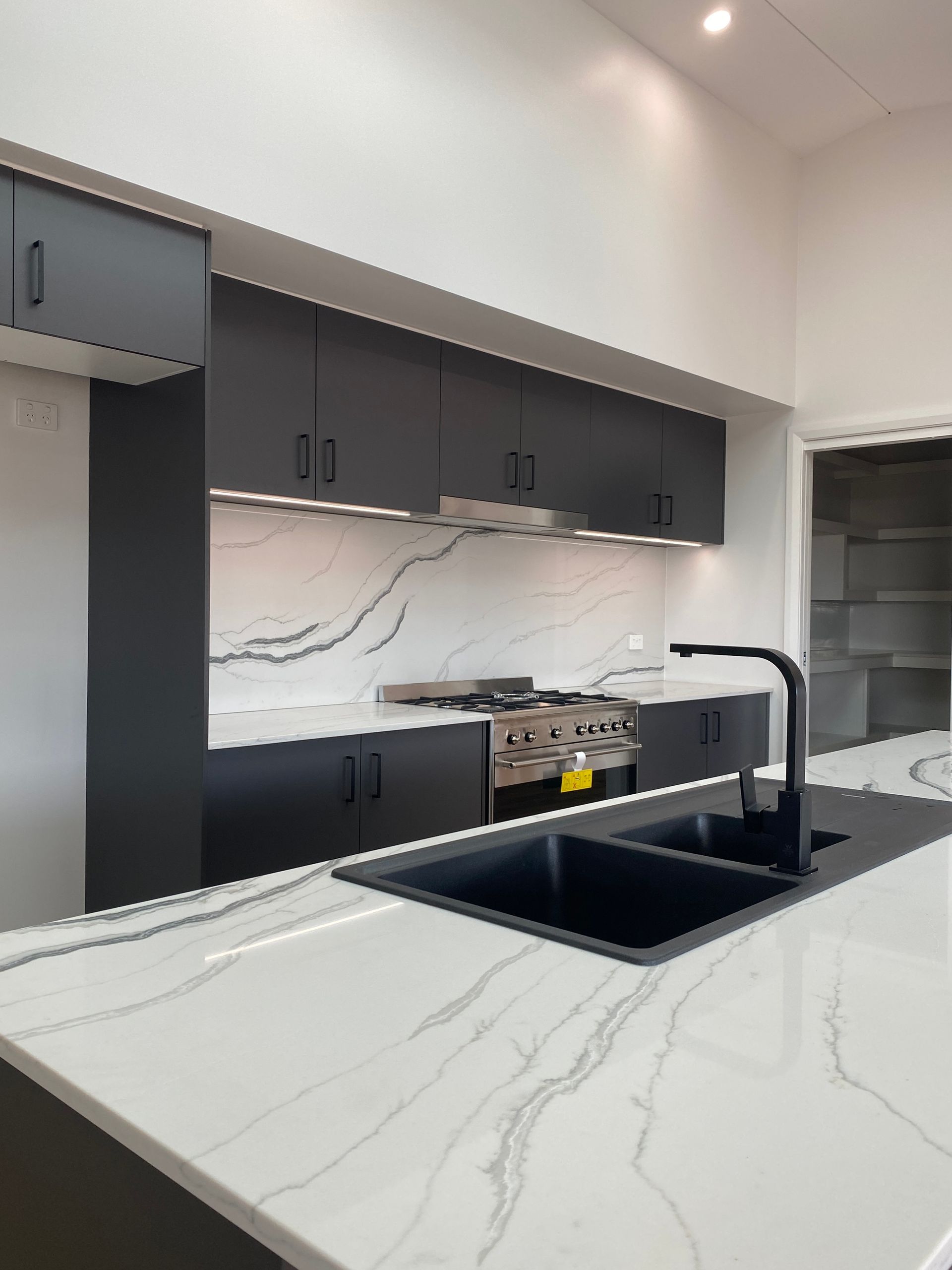 Marble Countertop With Black Sink — Kitchen Renovations in Dubbo, QLD