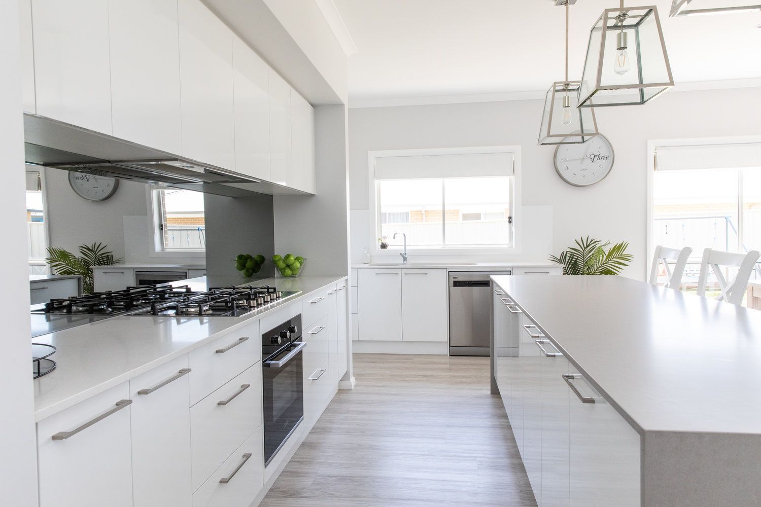 White Kitchen With Lantern Lights — Kitchen Renovations in Dubbo, QLD