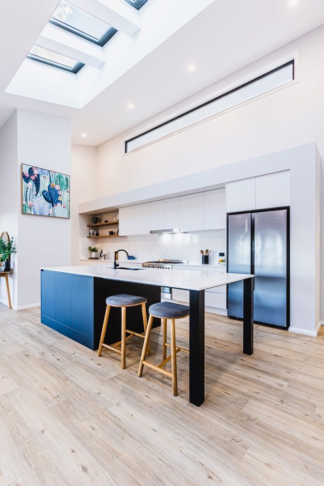 Countertop With Button Barstools — Kitchen Renovations in Dubbo, QLD