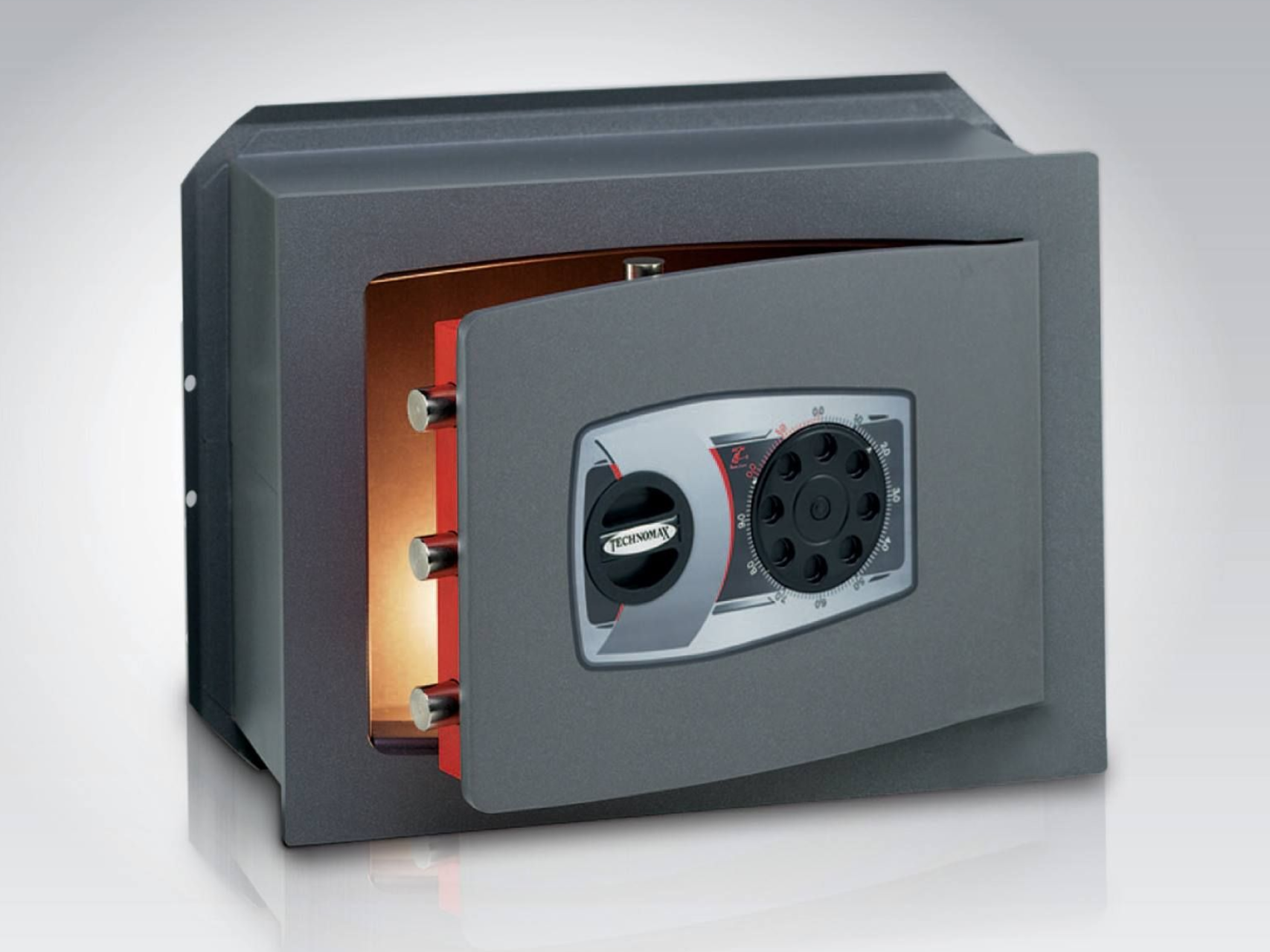 Aprire la cassaforte grigia con l'interno rosso, rivelando il meccanismo di chiusura.