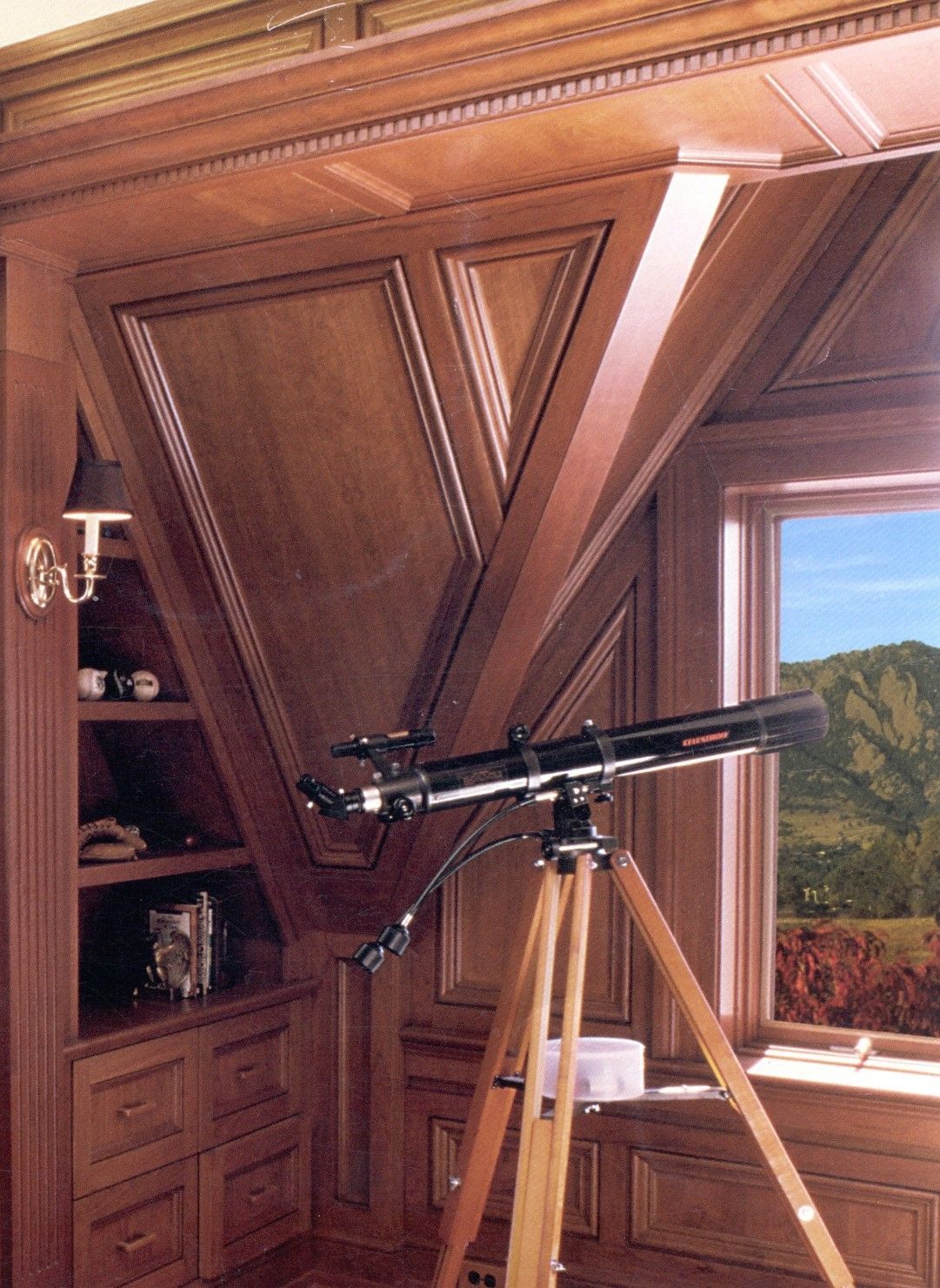 a person with green paint on their hands is holding a paint brush .