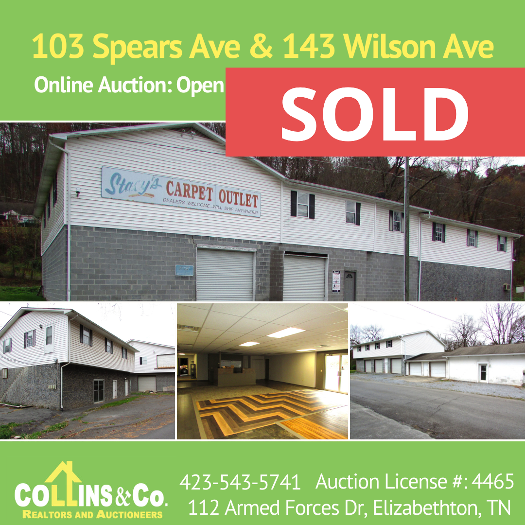 A sold sign for 103 spears ave and 143 wilson ave
