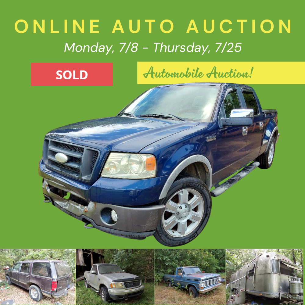 A blue truck is being sold at an online auto auction