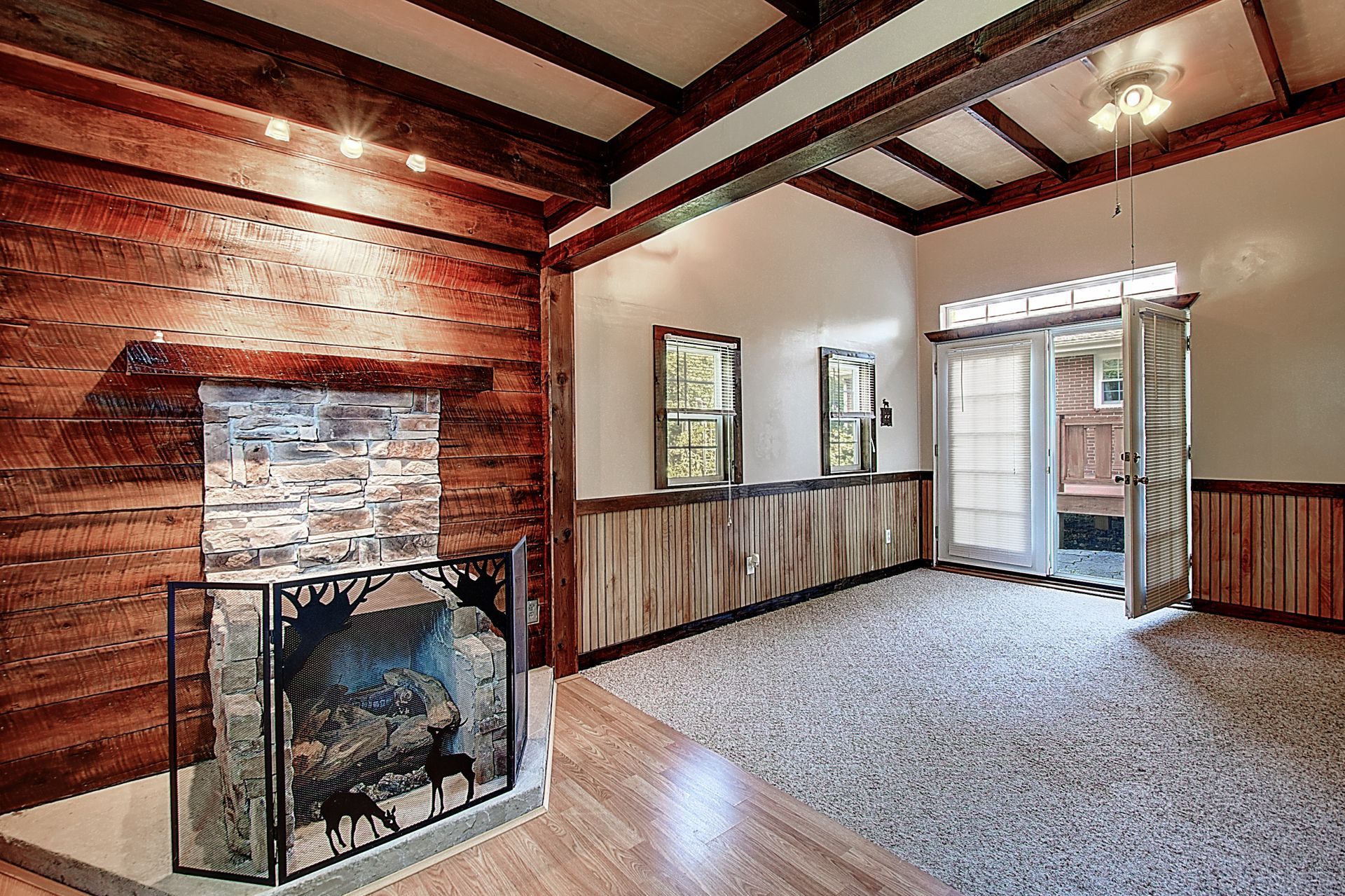 There is a fireplace in the middle of the room.