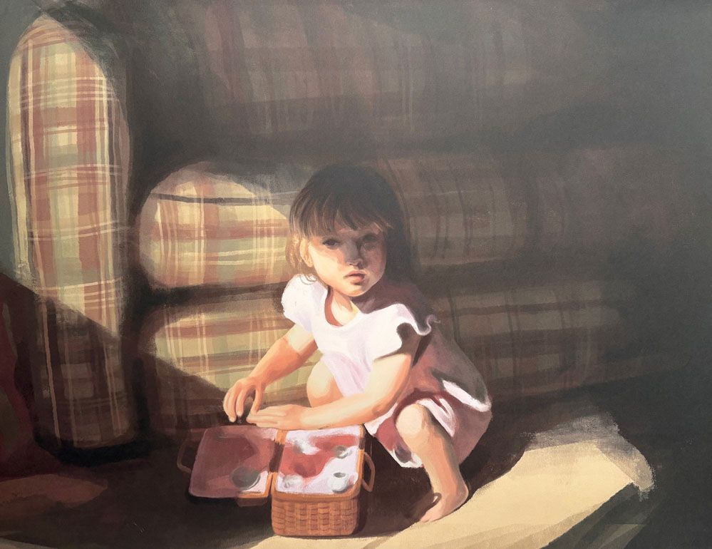 Young child crouches near a basket, illuminated by sunlight. Plaid couch in the background.
