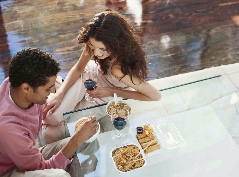 couple eating in a kitchen