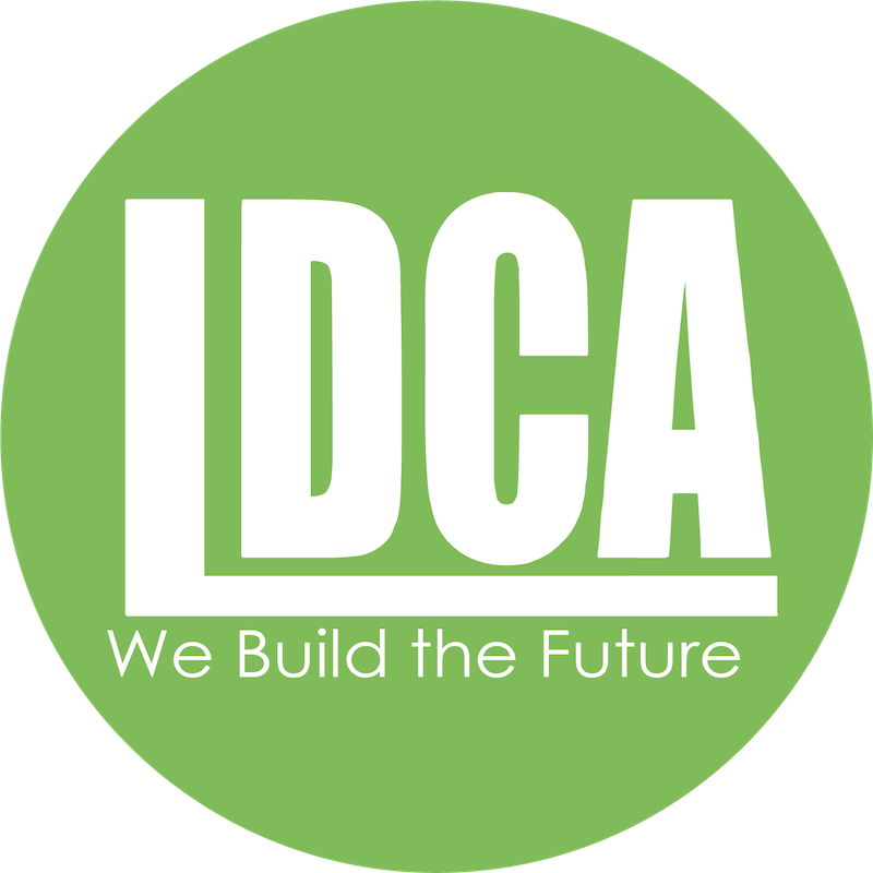 LDCA logo in white on a green circle with the tagline “We Build the Future”