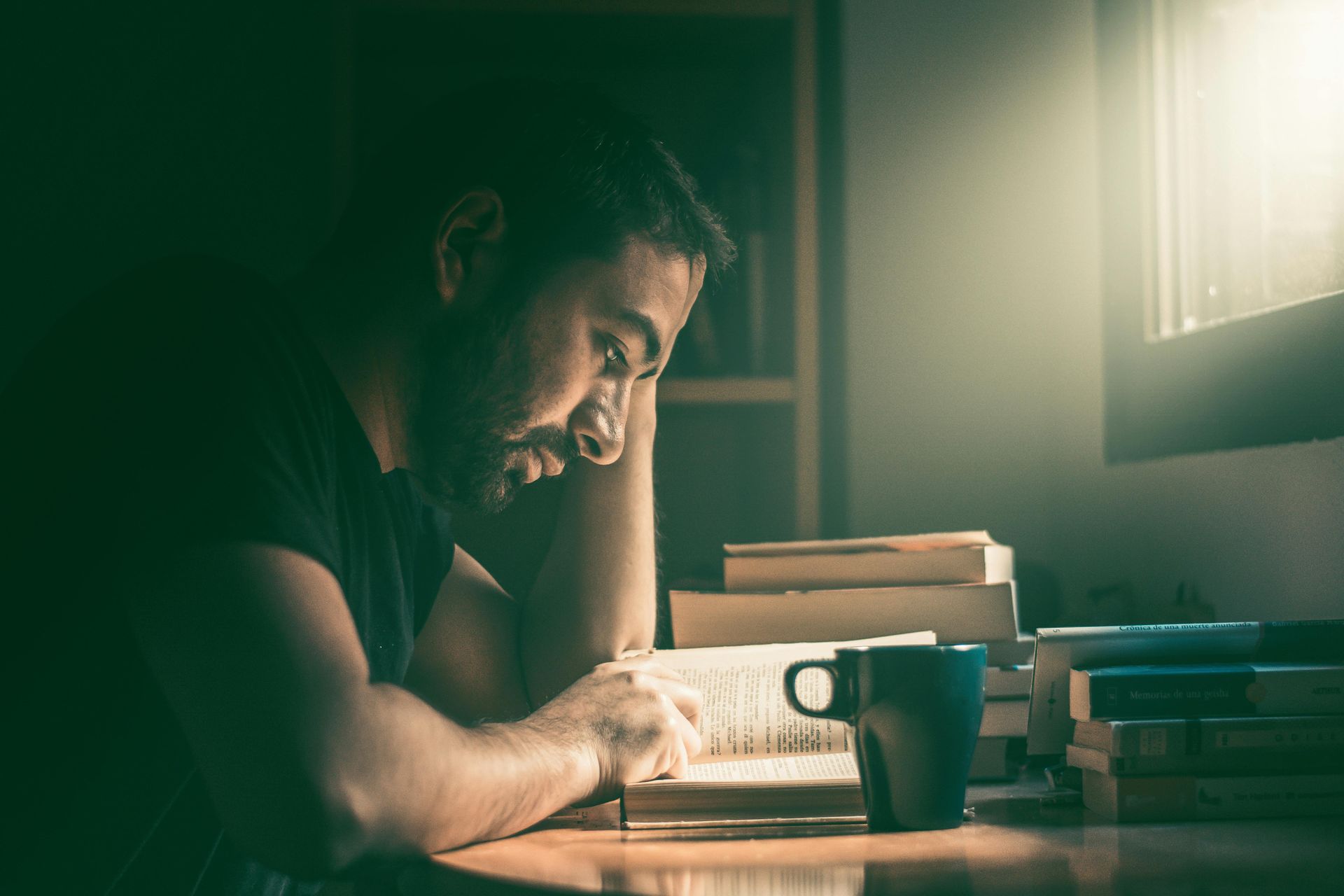 Man at desk reading