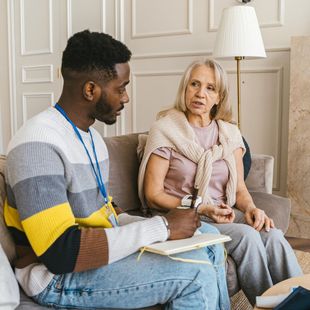 People talking on a sofa