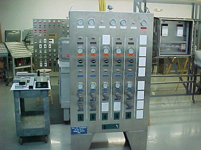 A row of electrical panels with numbers on them