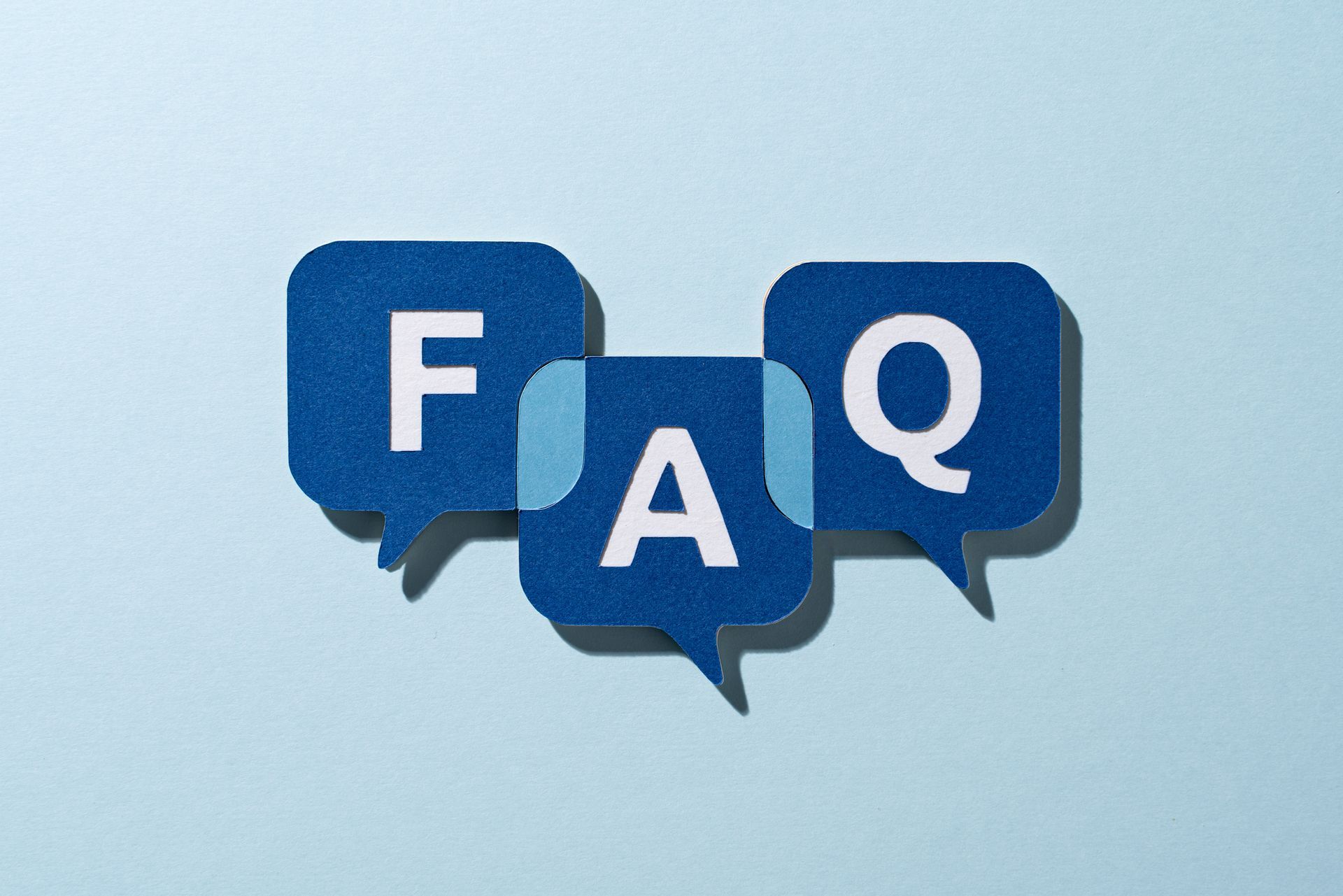 Blue speech bubbles forming the letters 