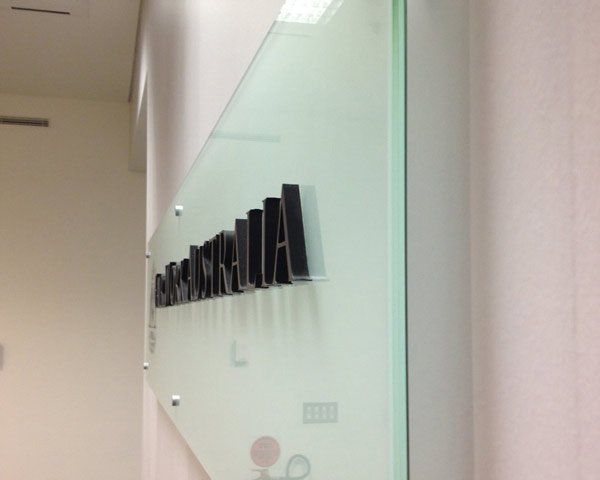 glass reception sign