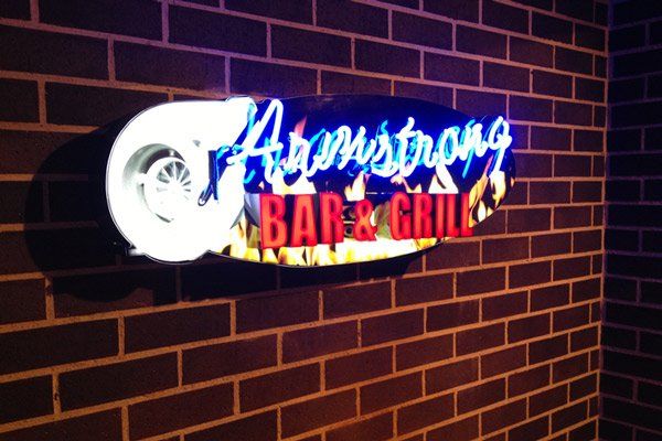 bar and grill neon sign