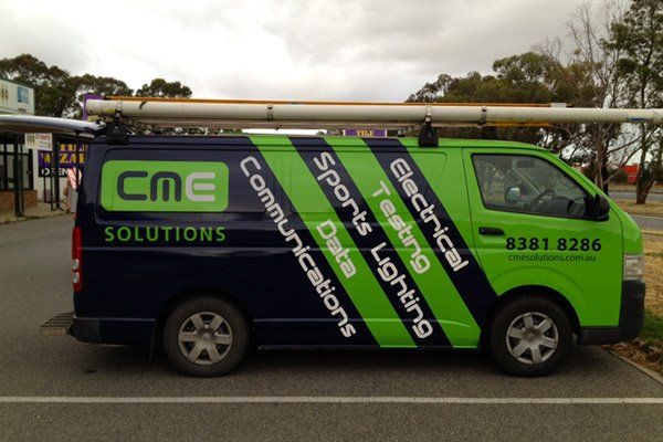 green and black van wrap