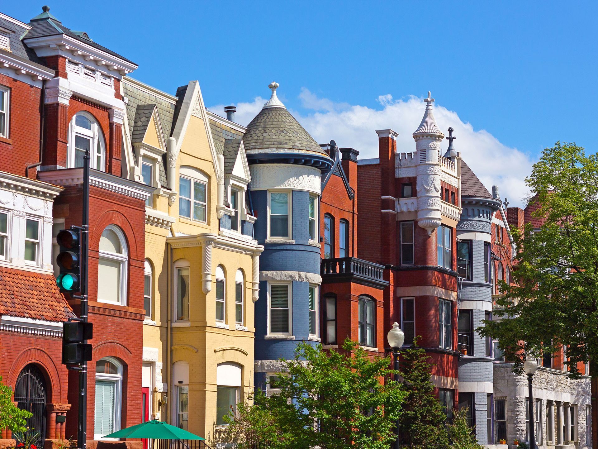 A row of colorful buildings on a sunny day