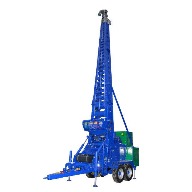 Perforatrice blu su ruote, utilizzata per la perforazione di fori, posizionata all'esterno.