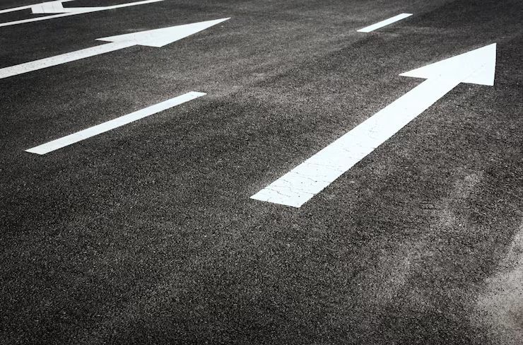 commercial tarmac with white line arrow