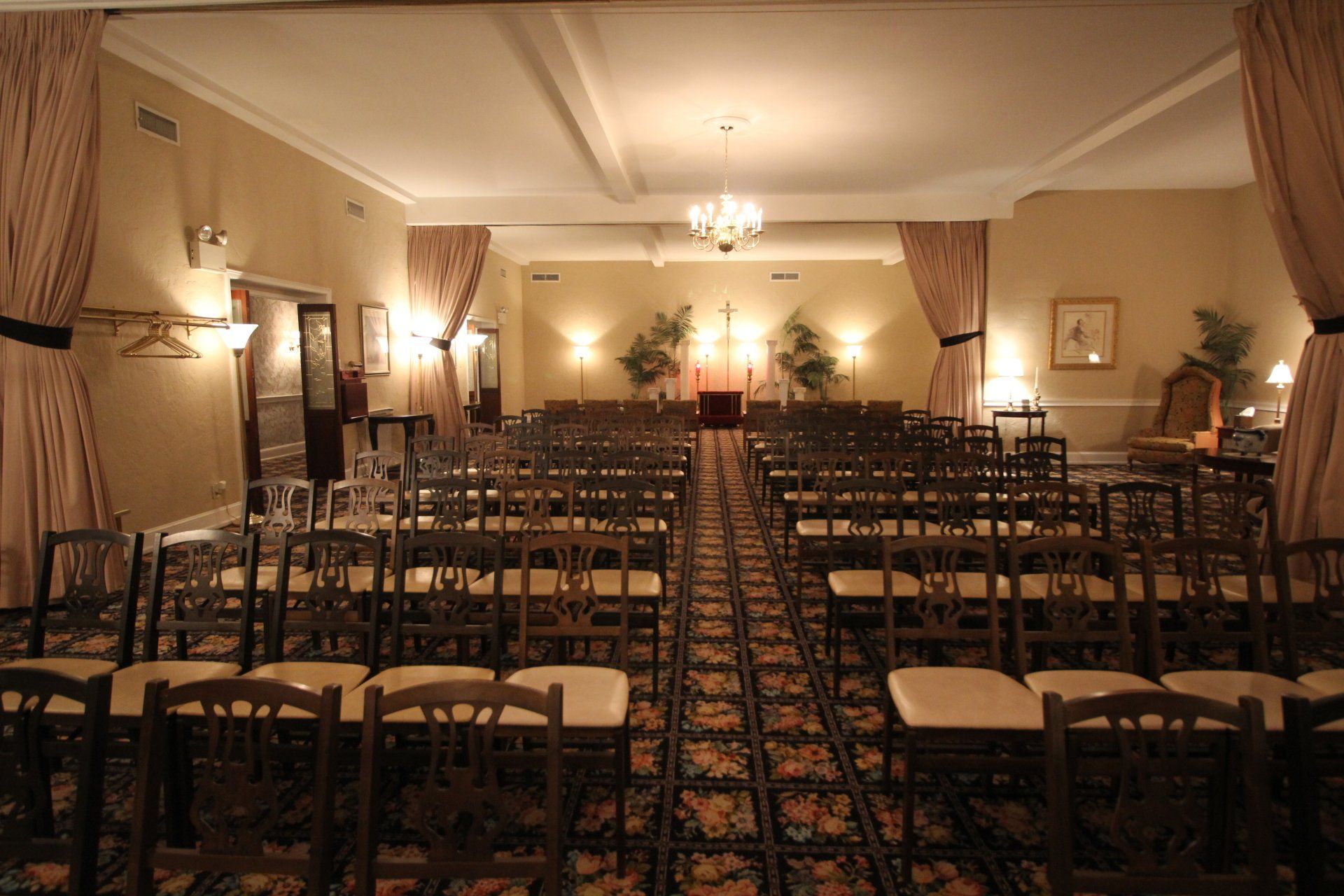 A large room with rows of chairs in it