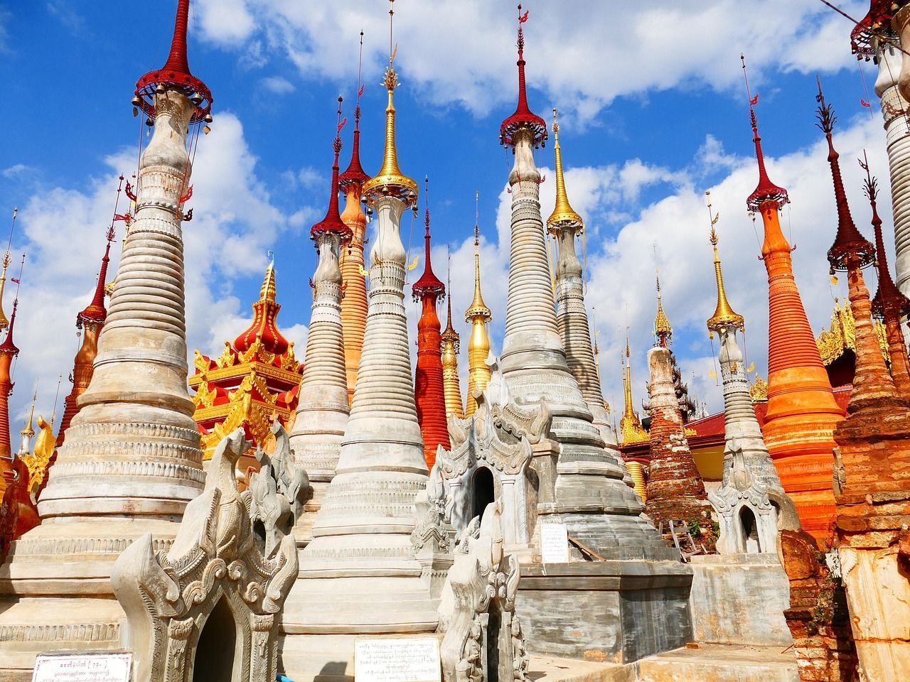 Image of Pagoda temple, with colors like orange, yellow, and beige