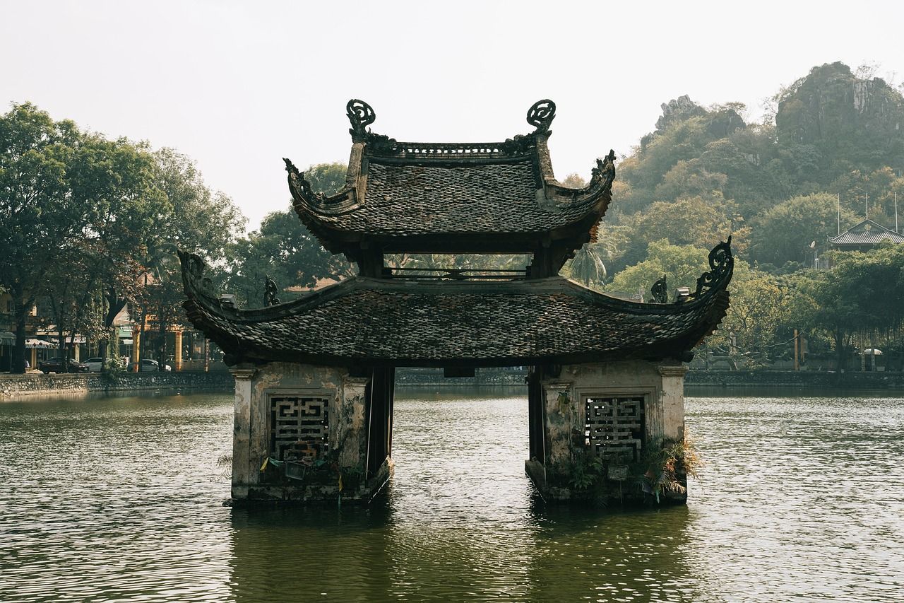 Image of a pagoda, over a lake